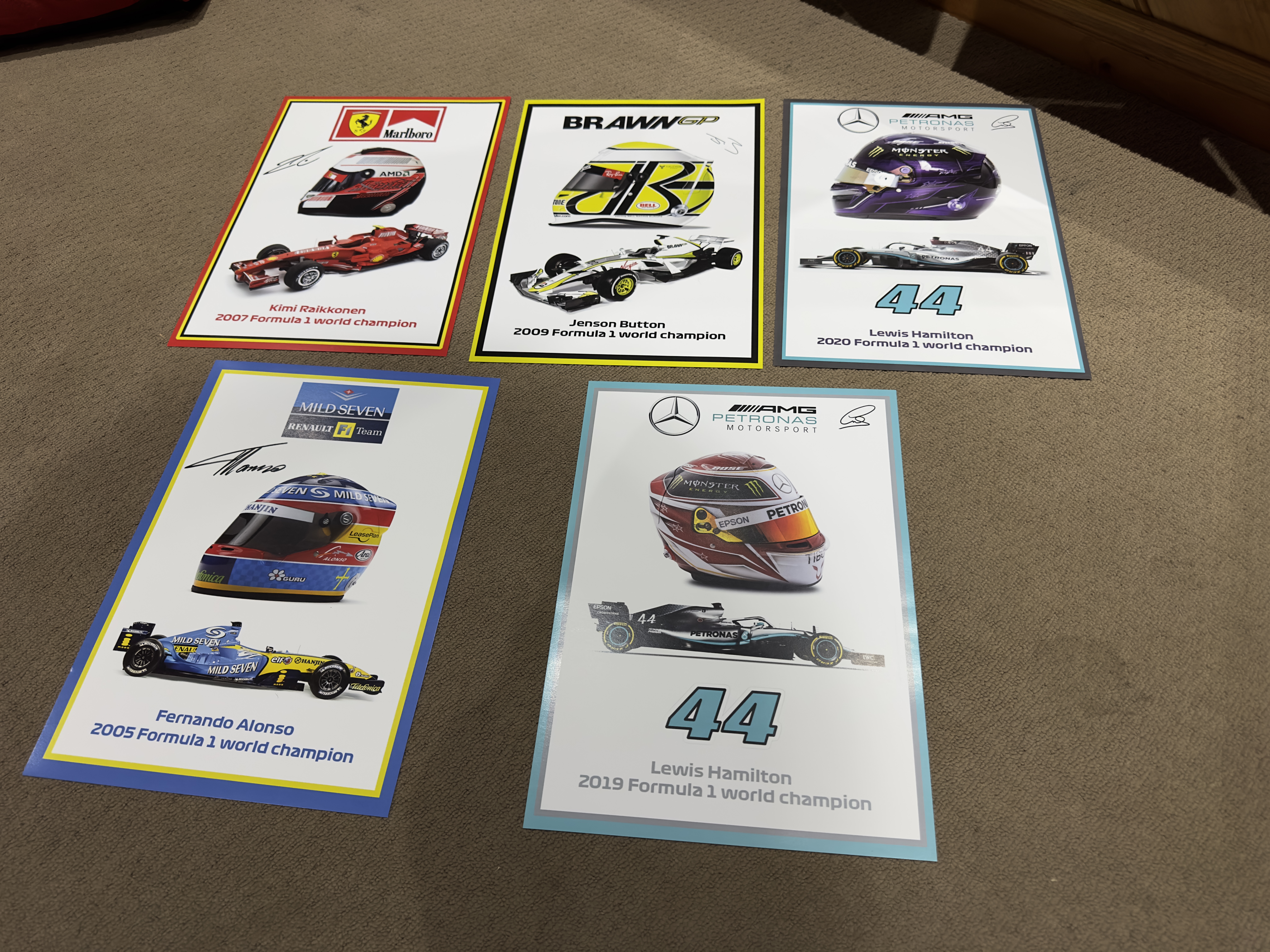 Signed F1 helmet prints collection – A3 satin set featuring Alonso, Mansell, Hamilton, Räikkönen, Button, Schumacher, Vettel, Verstappen, Senna, Rosberg, Coulthard